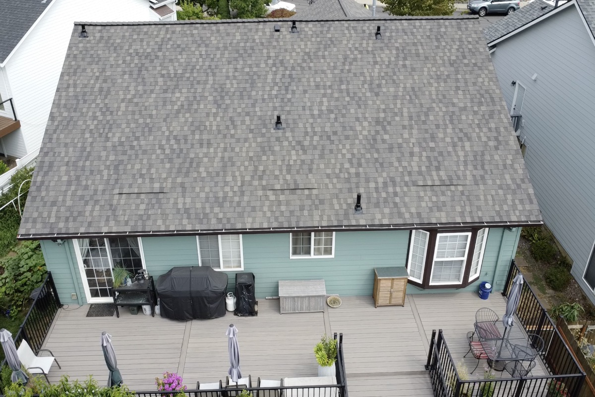 Residential Roofing with Deck Integration